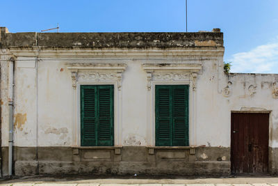 Exterior of old building against sky