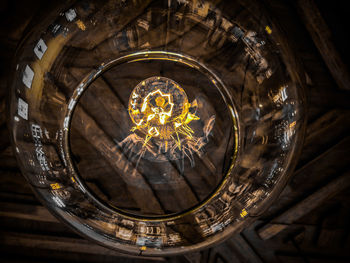 Directly below shot of illuminated glass ceiling