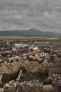 High angle view of illuminated cityscape against sky