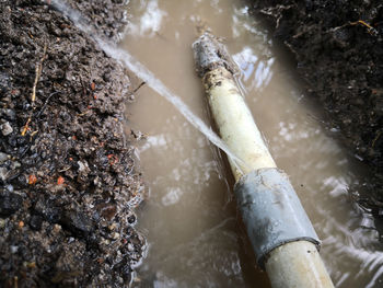 High angle view of cigarette on river