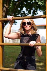 Portrait of mature woman having fun on a playground