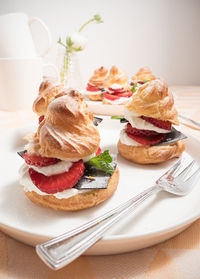 Close-up of cake in plate on table