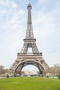 View of tower against cloudy sky