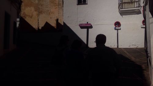 Silhouette man in city