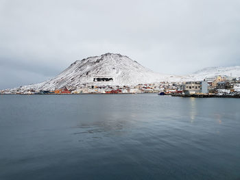 Scenic view of snow covered mountain against sky