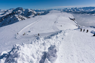 Snow covered mountain against sky