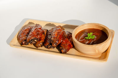 High angle view of food on table against white background