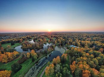 High angle view of trees against sky during sunset