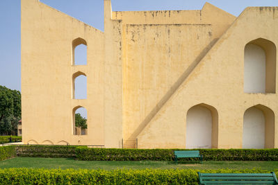 Built structure by building against sky