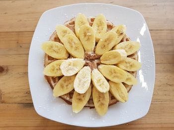 Close-up of fruits in plate on table