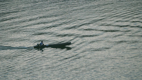 High angle view of man surfing in sea