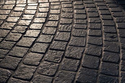 Full frame shot of tire tracks on street
