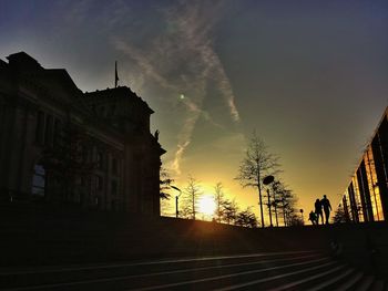 Built structure against sky at sunset