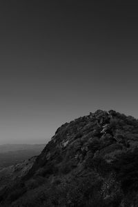Low angle view of mountain against clear sky