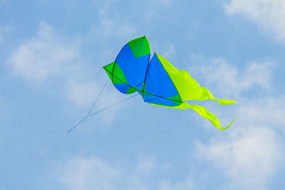 Low angle view of kite against sky