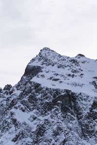 Scenic view of snow covered mountain against sky