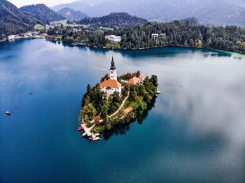 High angle view of lake by tree mountain