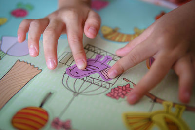 Close-up of hands making craft