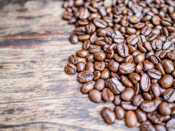 Close-up of coffee beans on table