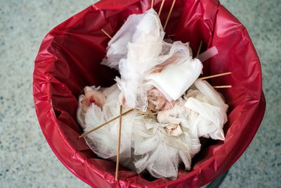 High angle view of bouquet on garbage