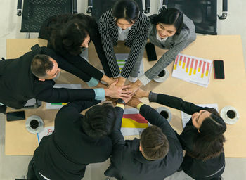 High angle view of people on table