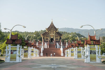 View of temple against building