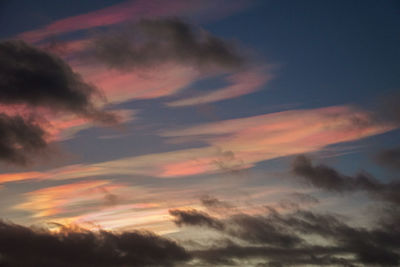 Low angle view of dramatic sky during sunset