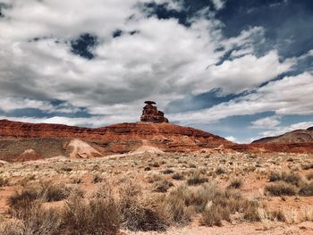 Rock formations on landscape against sky