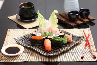 Sushi in plate on table