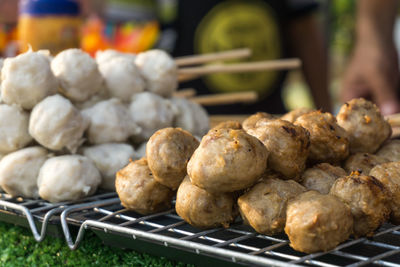 Close-up of meat on barbecue grill