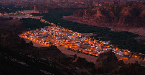 High angle view of illuminated buildings in city