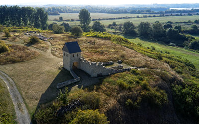 Aerial view of a medieval castle gate on a hill
