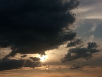 Low angle view of cloudy sky during sunset