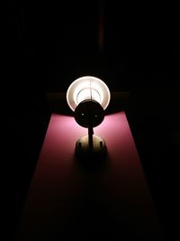 Low angle view of illuminated lamp