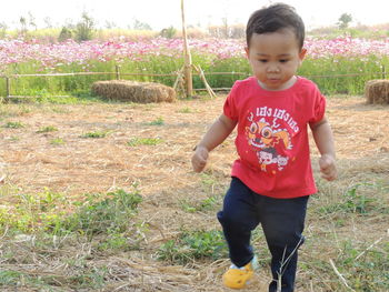 Boy playing on field