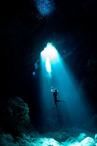 Person swimming in sea