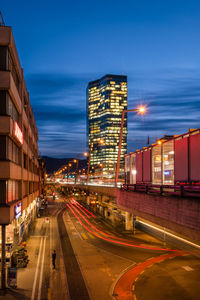 Illuminated buildings against sky