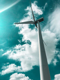 Low angle view of wind turbine against sky