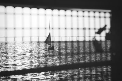 Close-up of sailboat on river