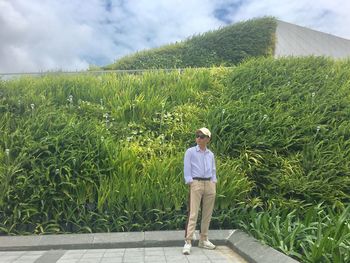 Full length of man standing in farm