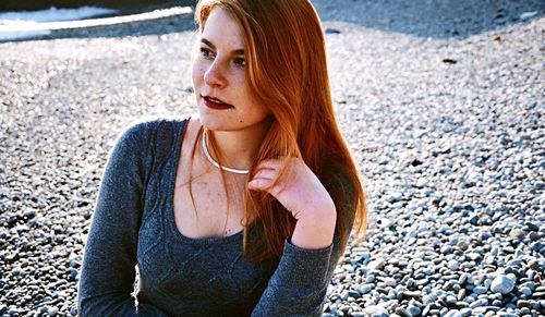 Portrait of young woman on the road