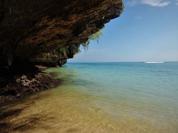 Scenic view of beach and sea against sky