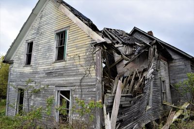 Low angle view of old building against sky