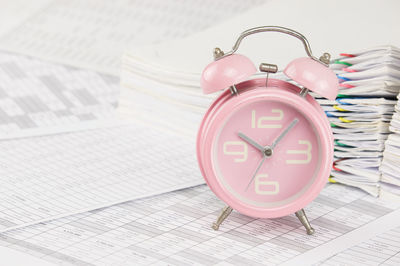 Close-up of clock on table