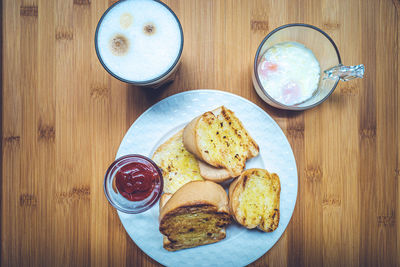 High angle view of breakfast served on table