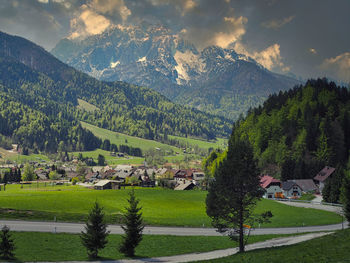 Scenic view of landscape and mountains against sky