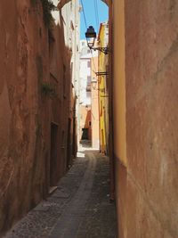 Narrow alley along buildings