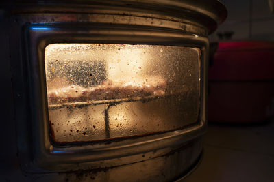 Close-up of glass jar on table