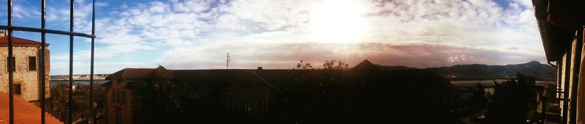 Sun shining through clouds