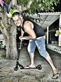 Portrait of man skateboarding on skateboard